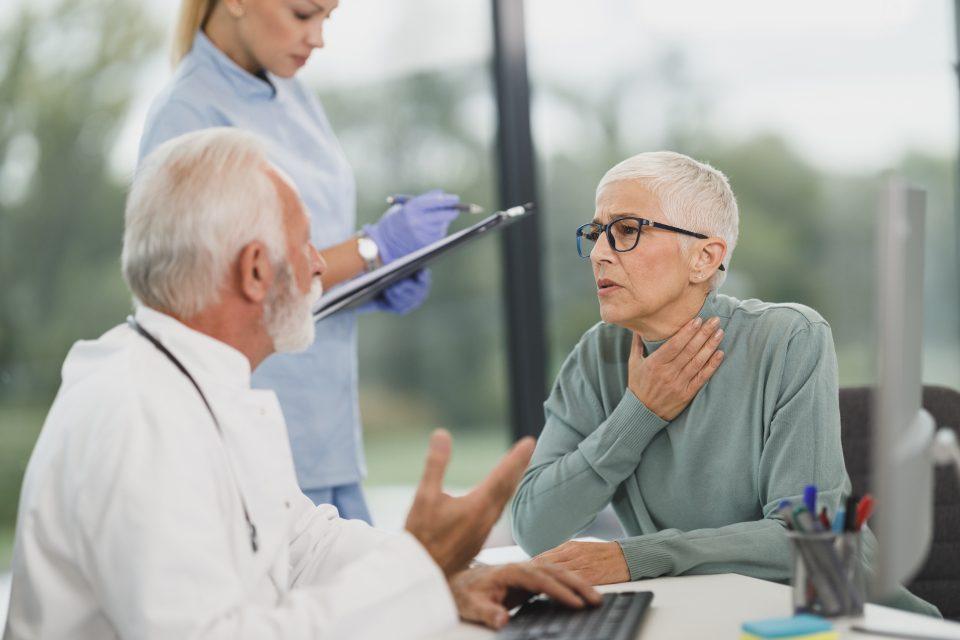 A nurse and doctor reviewing a client's complex care needs together